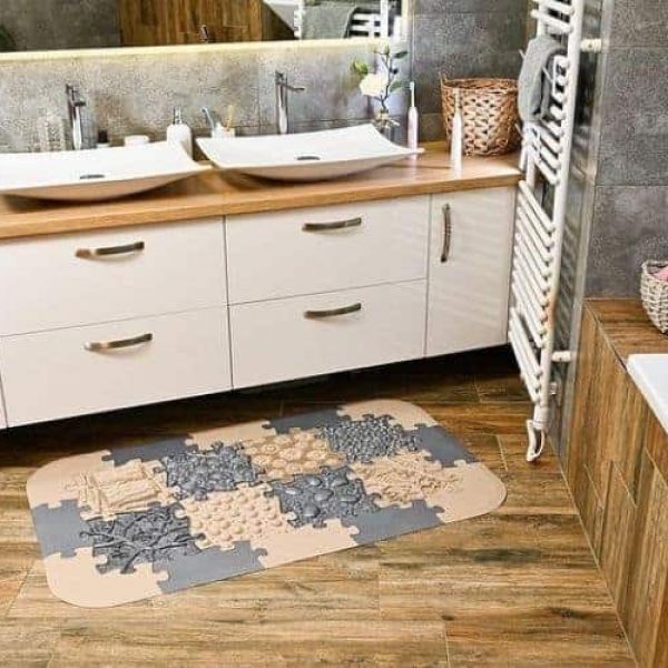 Muffik Orthopedic mats set in front of a bathroom cabinet in brown grey